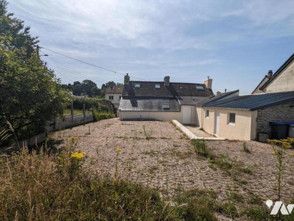 TOURLAVILLE - MAISON EN PIERRE ET JARDIN
