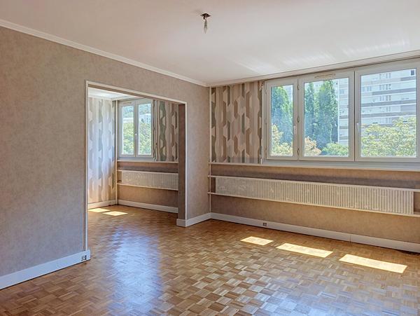 EXCLUSIVITÉ - Saint-Étienne - Appartement T4 de 72,26 m² - 2/3 chambres - Lumineux - 5ème étage - Cave - Stationnement collectif - DPE C - Proche Parc de l'Europe