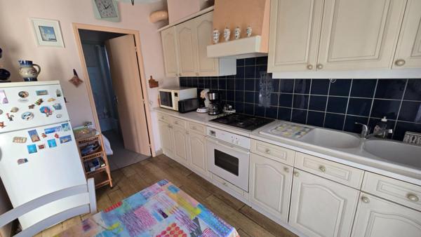 Maison  4 pièce(s) de 91 m2  avec 3 chambres  et 1 garage