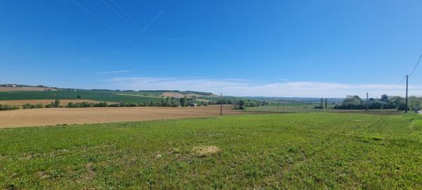 Terrain plat au calme à Marignac avec vue dégagée.