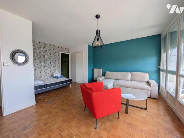 Appartement F1bis - cave et stationnement 