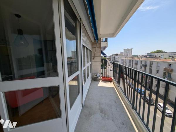 Appartement F1bis - cave et stationnement 