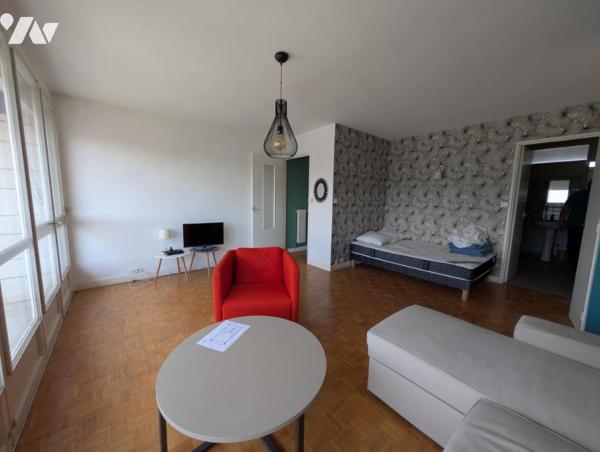 Appartement F1bis - cave et stationnement 