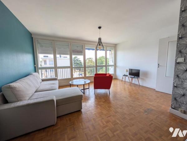 Appartement F1bis - cave et stationnement 