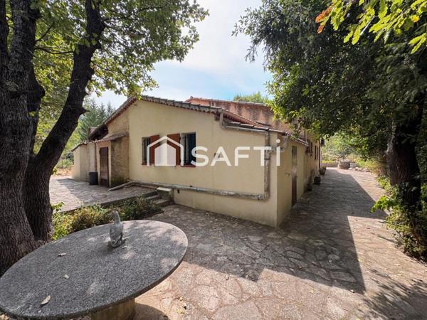 Maison T3 avec véranda sur grand terrain boisé