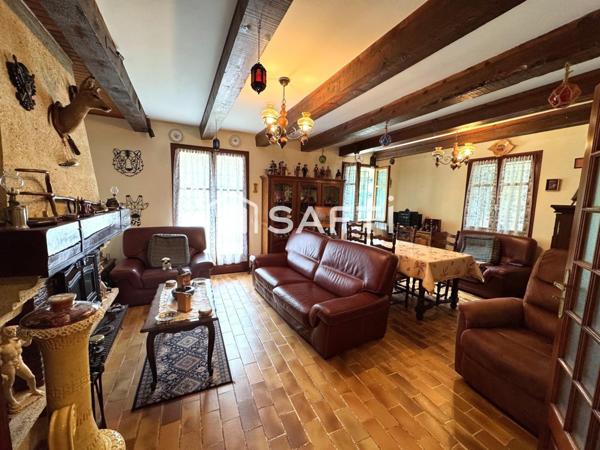 Maison T3 avec véranda sur grand terrain boisé