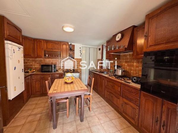 Maison T3 avec véranda sur grand terrain boisé