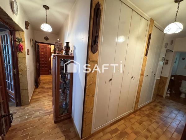 Maison T3 avec véranda sur grand terrain boisé