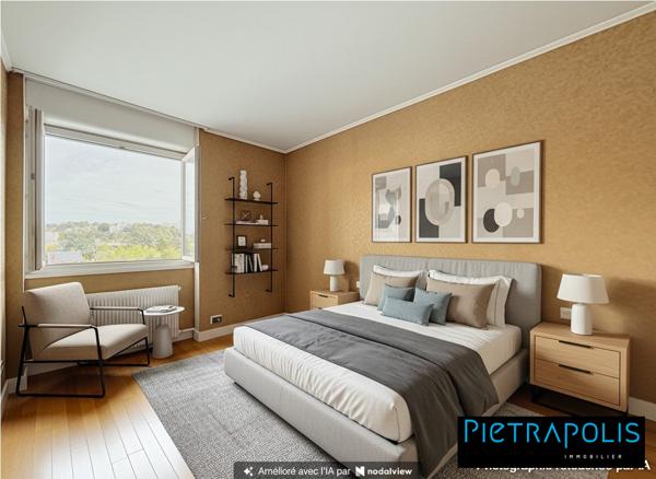 Appartement T4 avec balcon, cave et garage, en étage élevé, à proximité des écoles, transports et commerces
