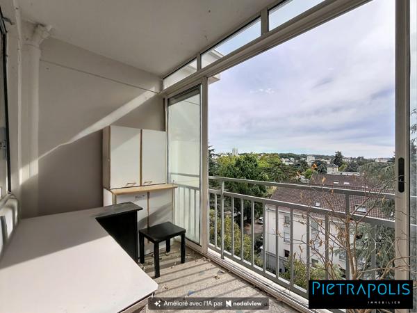 Appartement T4 avec balcon, cave et garage, en étage élevé, à proximité des écoles, transports et commerces