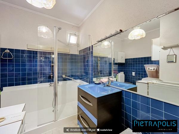 Appartement T4 avec balcon, cave et garage, en étage élevé, à proximité des écoles, transports et commerces