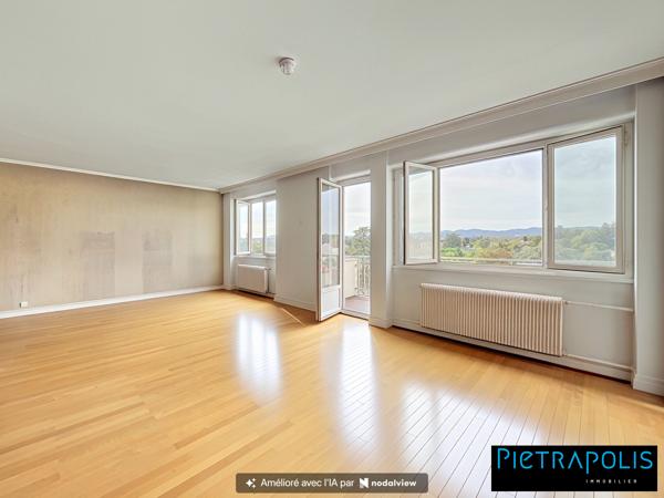 Appartement T4 avec balcon, cave et garage, en étage élevé, à proximité des écoles, transports et commerces