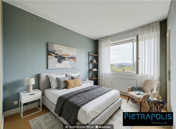 Appartement T4 avec balcon, cave et garage, en étage élevé, à proximité des écoles, transports et commerces