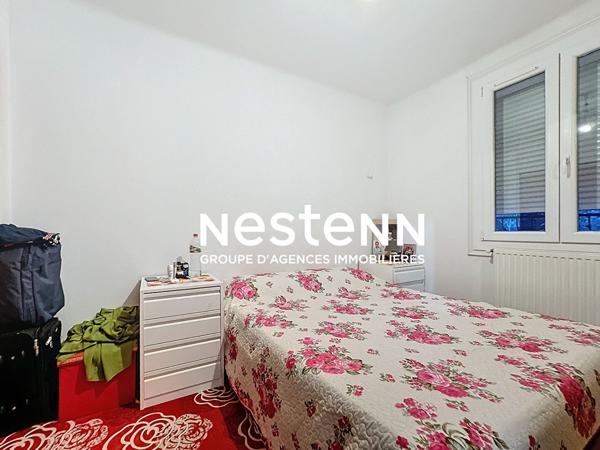 Immeuble à Perpignan de 3 appartements, 2 garages, places de parkings et jardin.