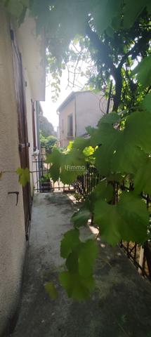 Maison 2 chambres accès balcon.