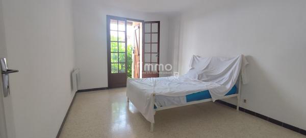 Maison 2 chambres accès balcon.