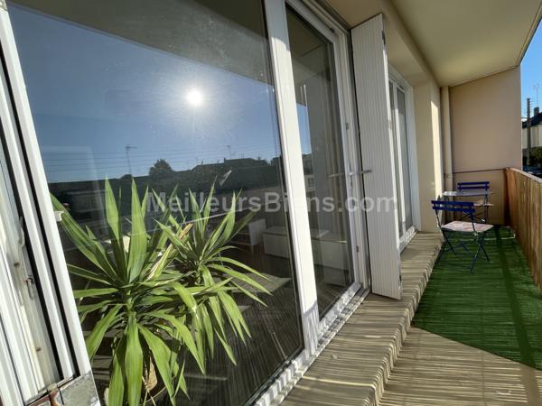 Appartement 2 chambres avec balcon, cave et parking