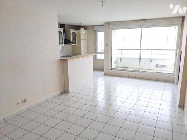 SAINT NAZAIRE - VILLE PORT / Appartement T4 - 91 m² avec stationnement en sous sol.