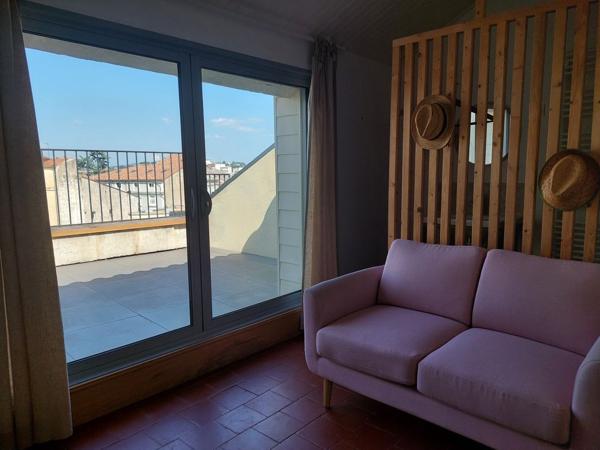 Duplex traversant avec terrasse