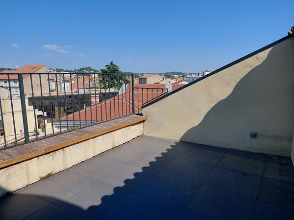 Duplex traversant avec terrasse