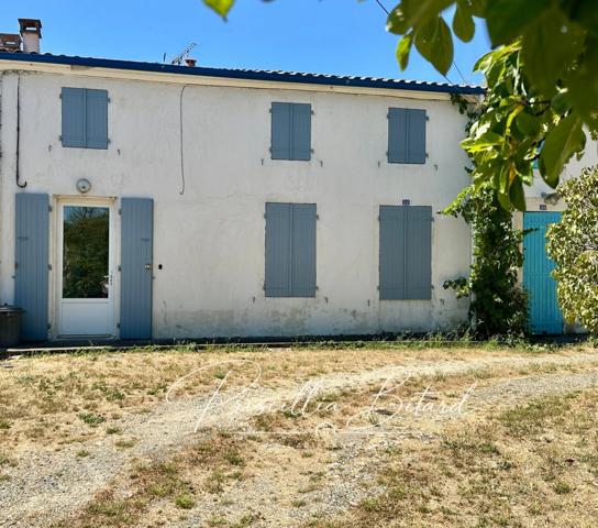 Le charme d'un environnement verdoyant allié au confort d'une maison familiale
