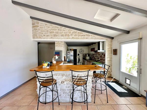 Le charme d'un environnement verdoyant allié au confort d'une maison familiale