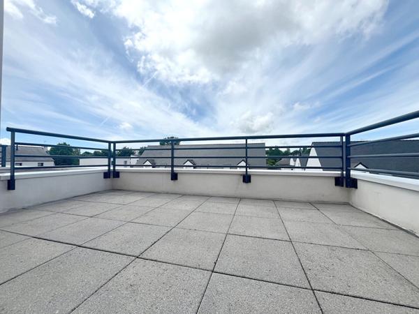 A VENDRE PLOEREN  proche bourg appartement 3 pièces en dernier étage 2 places de parking et cave