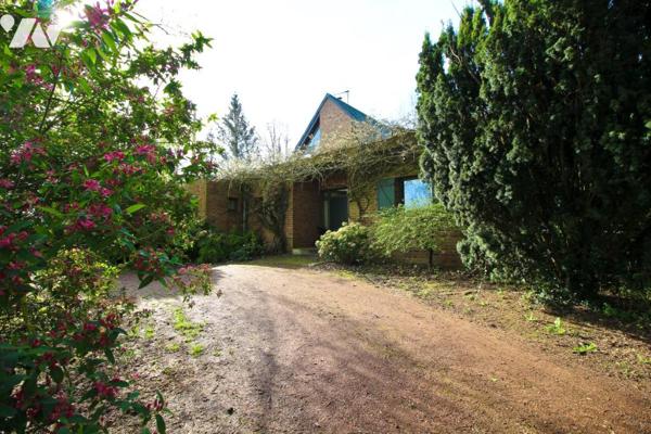 Maison et parc arboré