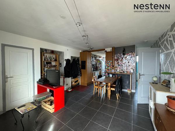 Appartement 4 pièces de 69m2 loué dans une copropriété arborée et sécurisée