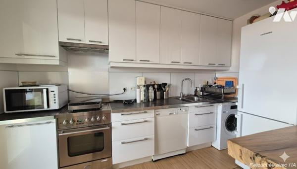 Au pied de la Place Général de Gaulle, un 3 Pièces en dernier étage avec terrasse et garage !