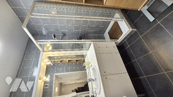 Au pied de la Place Général de Gaulle, un 3 Pièces en dernier étage avec terrasse et garage !