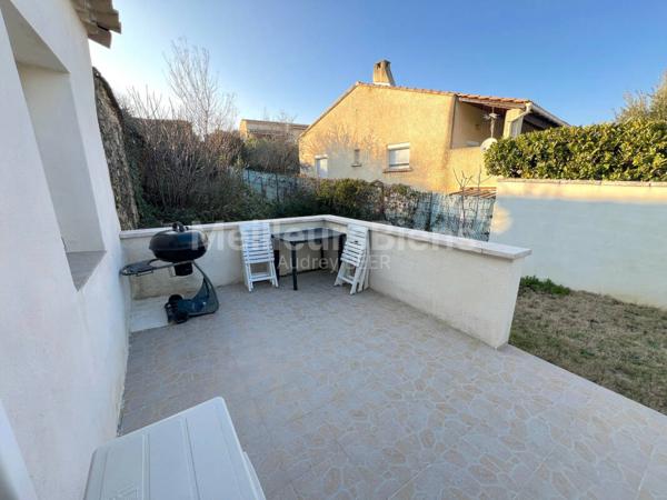 Ensemble immobilier 3 appartements: 245 m² avec jardin, terrasses et garage.