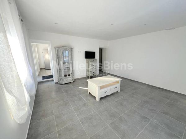 Ensemble immobilier 3 appartements: 245 m² avec jardin, terrasses et garage.