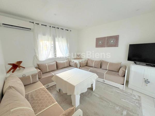 Ensemble immobilier 3 appartements: 245 m² avec jardin, terrasses et garage.