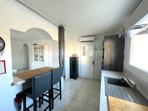 Ensemble immobilier 3 appartements: 245 m² avec jardin, terrasses et garage.