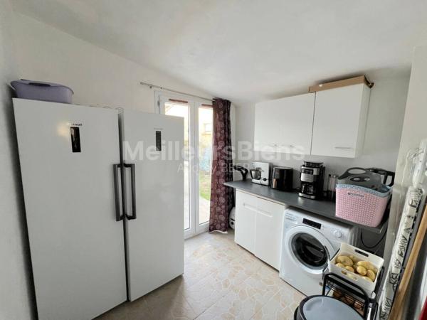 Ensemble immobilier 3 appartements: 245 m² avec jardin, terrasses et garage.