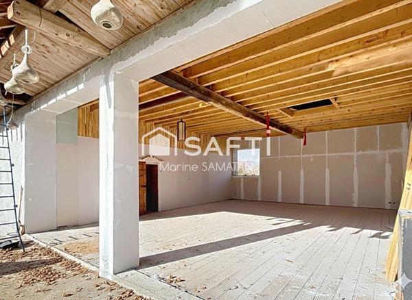 Maison mitoyenne à rénover avec locaux et garage