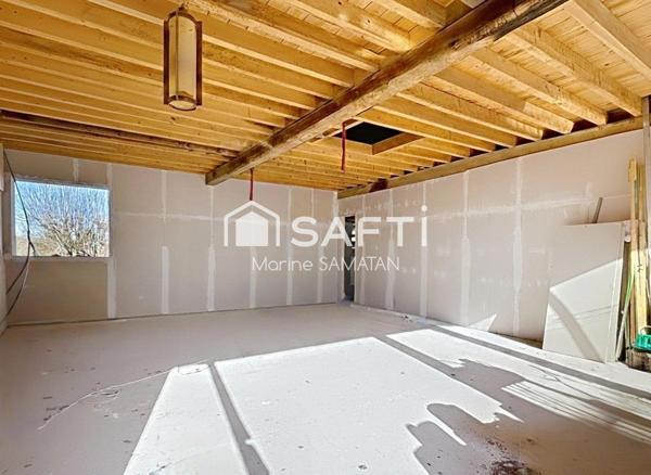 Maison mitoyenne à rénover avec locaux et garage