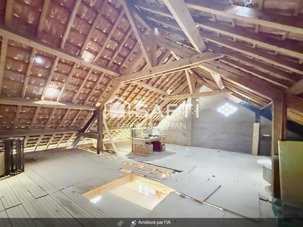 Maison mitoyenne à rénover avec locaux et garage