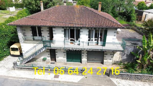Double logement possible, jardin et garage