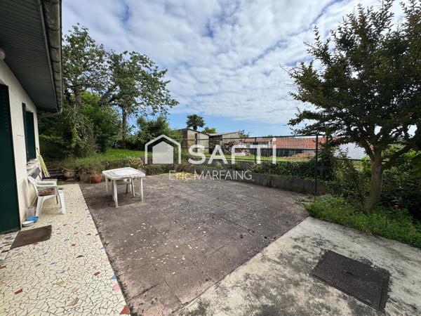 Double logement possible, jardin et garage