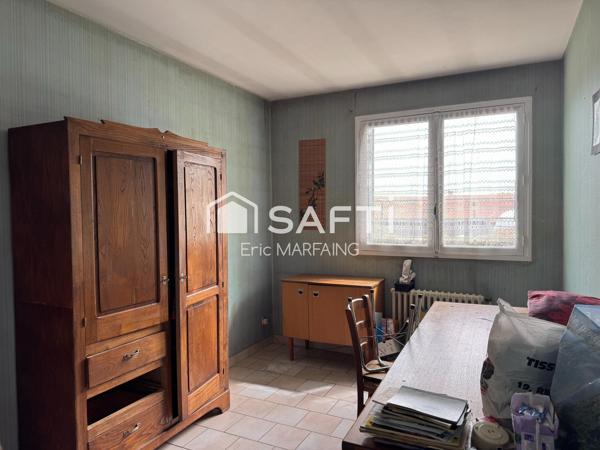 Double logement possible, jardin et garage