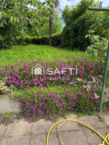Double logement possible, jardin et garage
