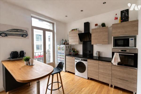 EN EXCLUSIVITE RUE DE VESLE - 3 pièces avec balcon