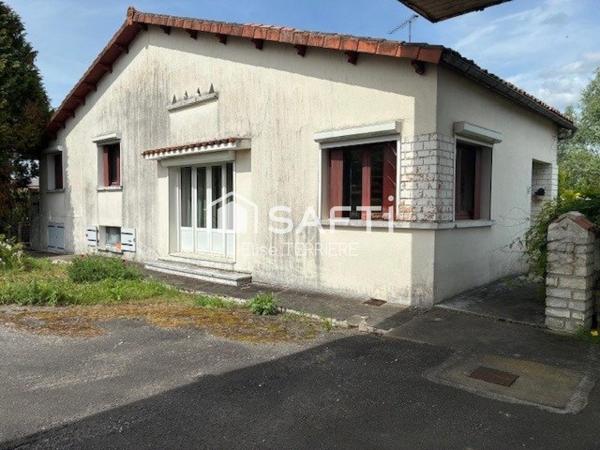 Maison 6 pièces avec jardin, étang de 2138m2, garage et 2 box