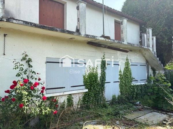 Maison 6 pièces avec jardin, étang de 2138m2, garage et 2 box