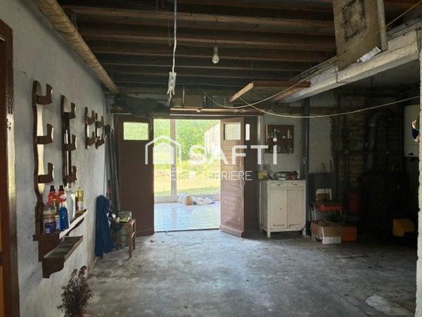 Maison 6 pièces avec jardin, étang de 2138m2, garage et 2 box