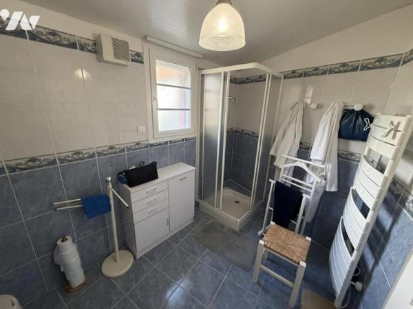 Maison en centre bourg avec vue dégagée et grand jardin 