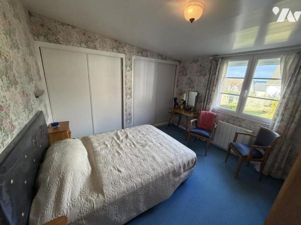 Maison en centre bourg avec vue dégagée et grand jardin 