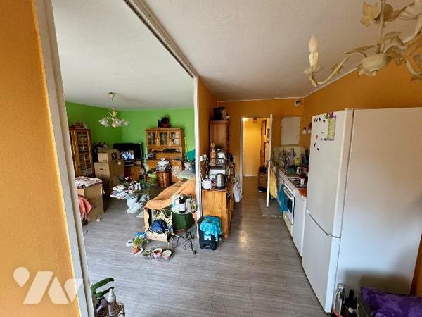 Appartement T3 à rénover de 69m² à proximité immédiate collège, lycée commerce, douane...